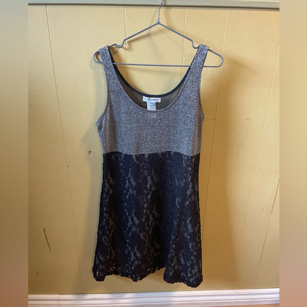 Women’s party dress, metallic underlay with a black lace on bottom half